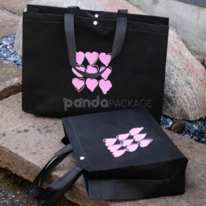 thickened non-woven tote bags with reinforced handles and snap button closure, custom printed for apparel and retail packaging