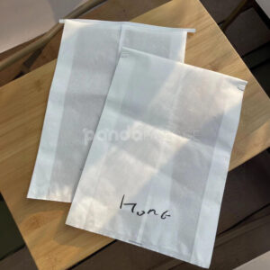 white tissue paper center seal clothing packaging bag with metal strip closure