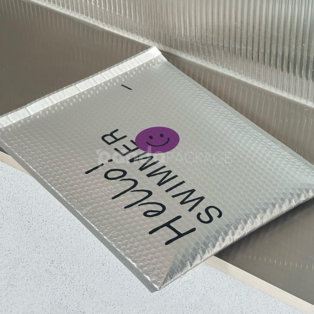 silver metallic bubble mailer bag with self-adhesive flap for secure shipping
