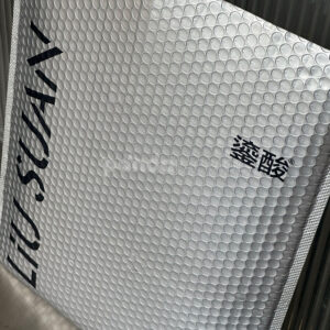 silver metallic bubble mailer bag with self-adhesive flap for secure shipping