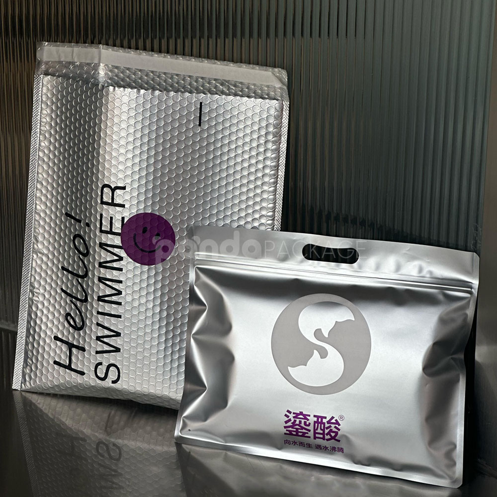 silver metallic bubble mailer bag with self-adhesive flap for secure shipping