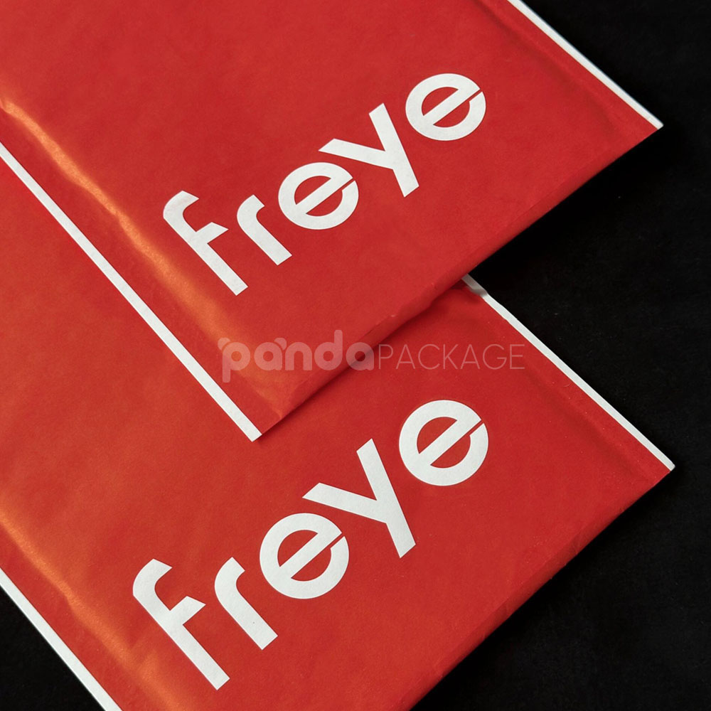 red kraft paper bubble mailer bag with self-adhesive closure for secure shipping