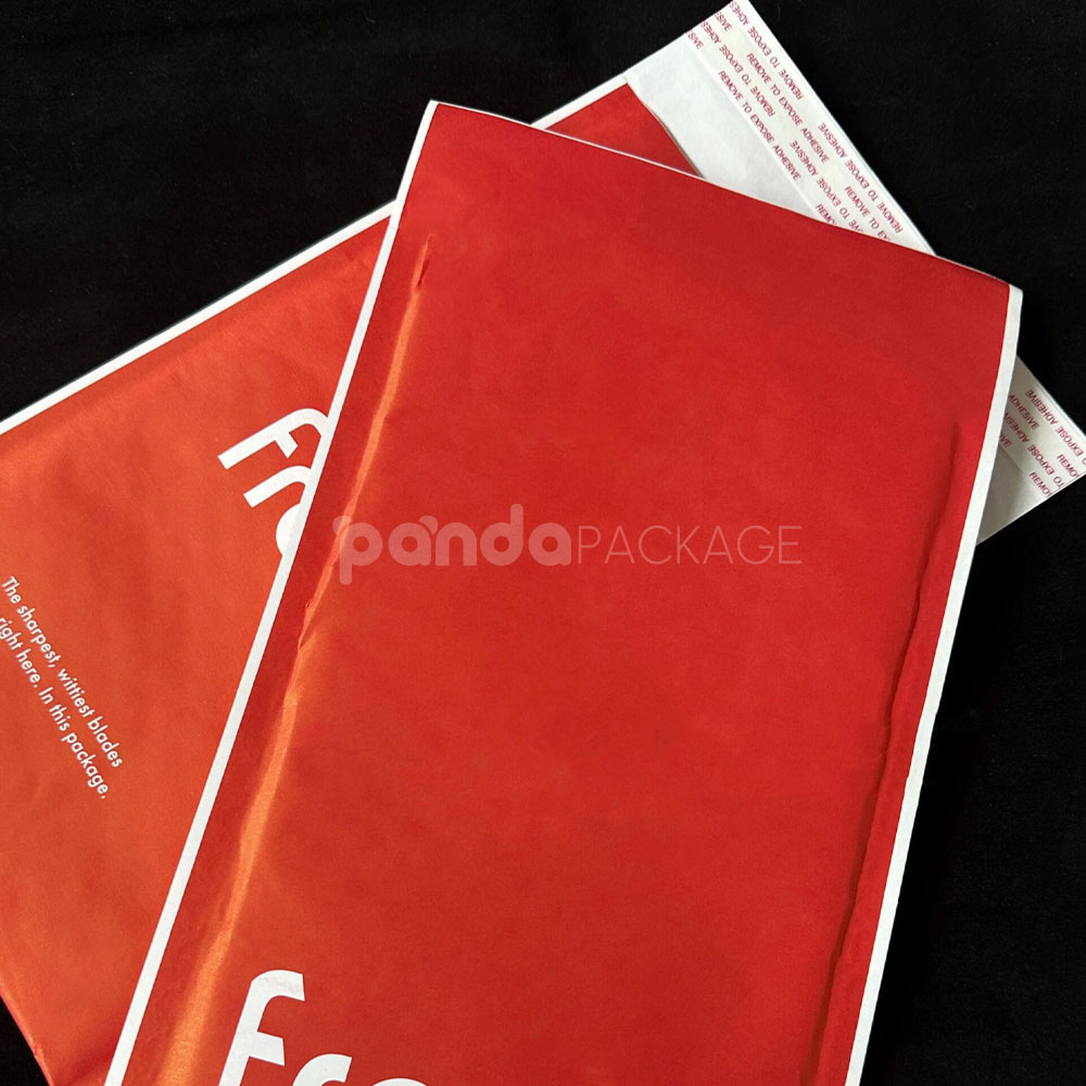 red kraft paper bubble mailer bag with self-adhesive closure for secure shipping