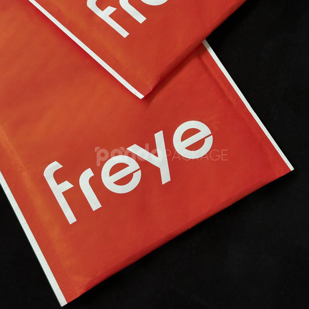 red kraft paper bubble mailer bag with self-adhesive closure for secure shipping