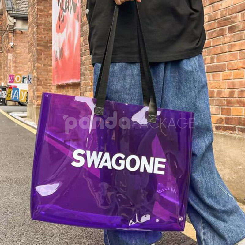 eco-friendly transparent pvc tote bag with wide handles for retail and apparel packaging