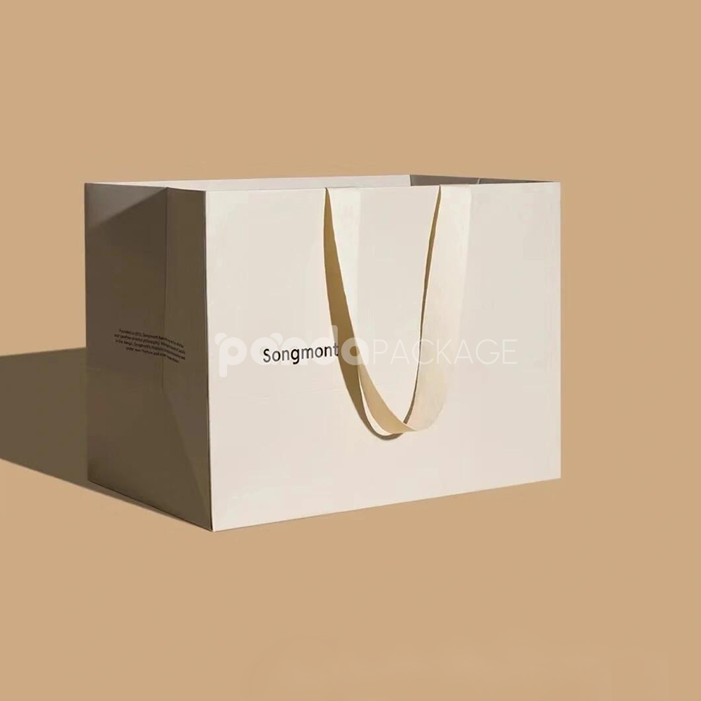 ivory rigid gift box with ribbon and matching paper bag for luxury product packaging