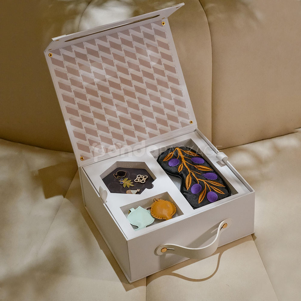 white magnetic rigid box with handle and gold rivets for luxury gift packaging