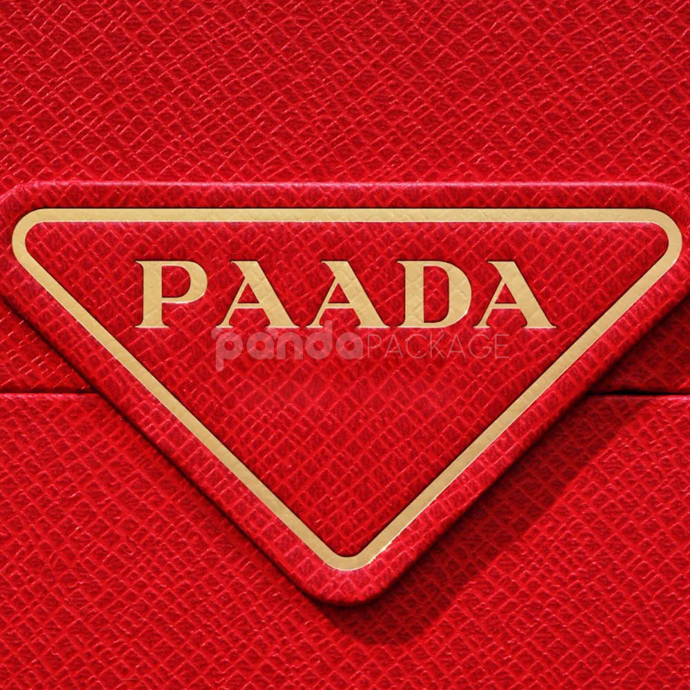 luxury magnetic flip lid rigid box with red textured surface and gold logo plaque for premium gift packaging
