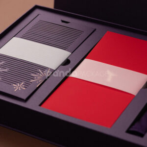 luxury magnetic flip lid rigid box in royal purple with gold foil logo and elegant compartment insert for premium gifts