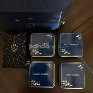 luxury octagonal rigid gift box in royal navy blue with gold foil logo, matching paper bag, and multi-drawer design for premium gifting