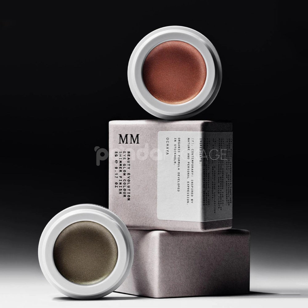 sustainable minimalist cosmetic packaging box made from recyclable paperboard with embossed typography and natural color finish