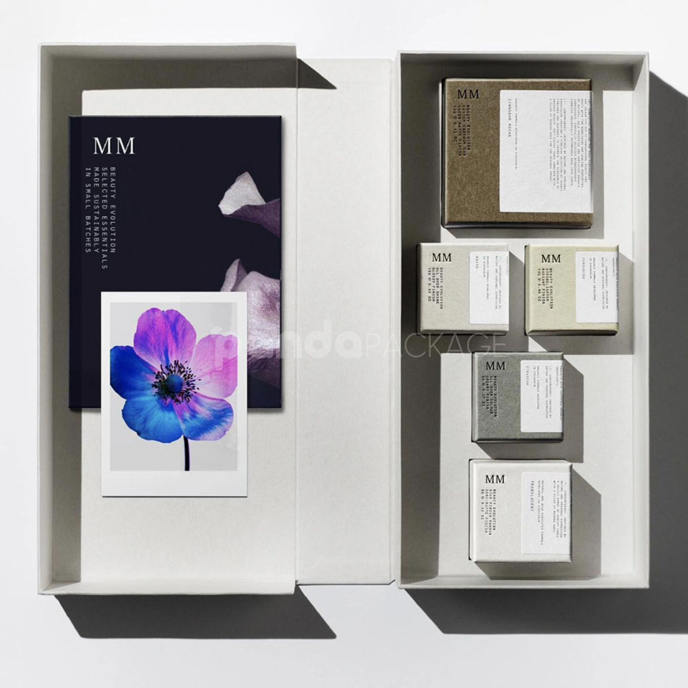 sustainable minimalist cosmetic packaging box made from recyclable paperboard with embossed typography and natural color finish