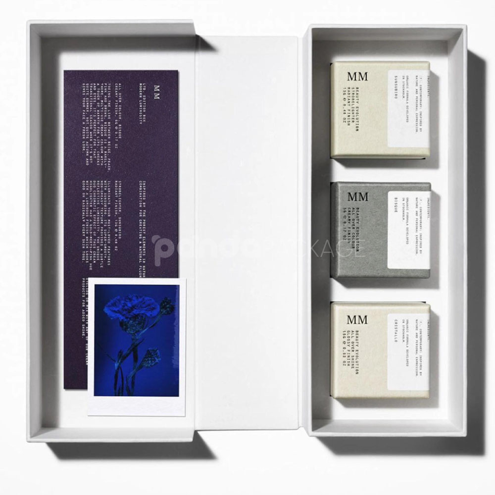 sustainable minimalist cosmetic packaging box made from recyclable paperboard with embossed typography and natural color finish