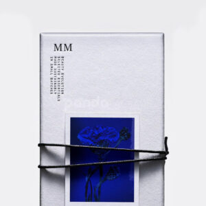 sustainable minimalist cosmetic packaging box made from recyclable paperboard with embossed typography and natural color finish