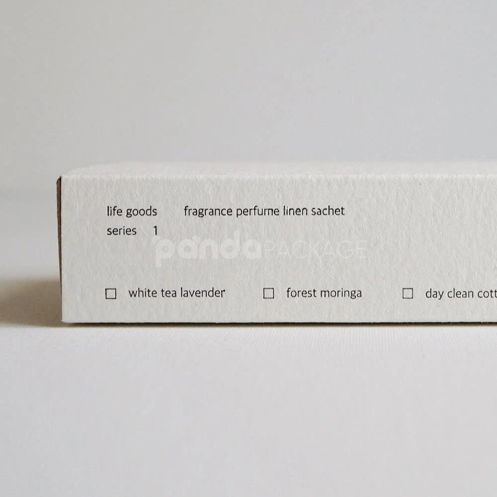 eco-friendly paperboard drawer box with minimalist design and kraft inner tray for skincare and fragrance packaging