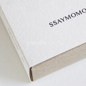 eco-friendly paperboard drawer box with minimalist design and kraft inner tray for skincare and fragrance packaging