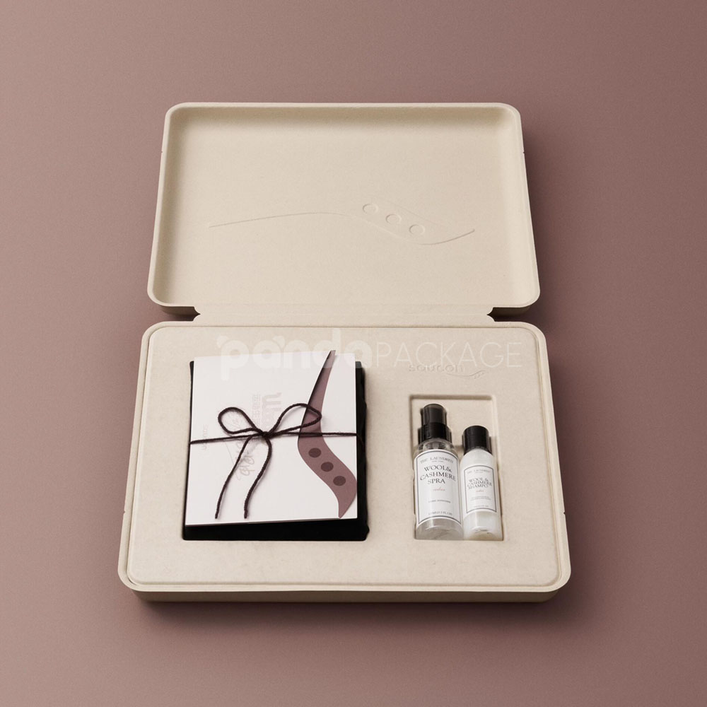 biodegradable molded pulp cosmetic box with hinged lid and custom insert for sustainable skincare gift packaging