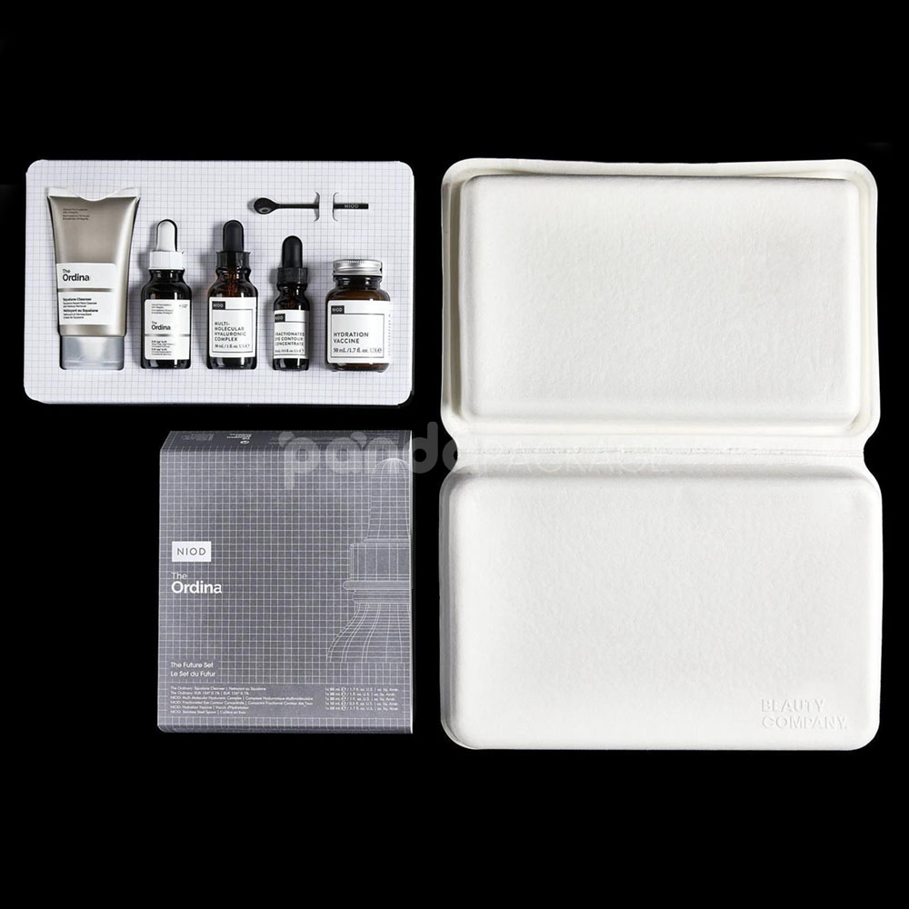 biodegradable white molded pulp skincare box with hinged lid and custom insert for sustainable cosmetic packaging