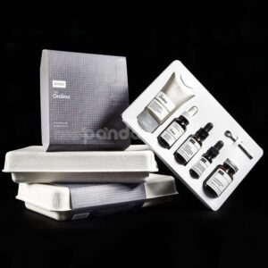 biodegradable white molded pulp skincare box with hinged lid and custom insert for sustainable cosmetic packaging