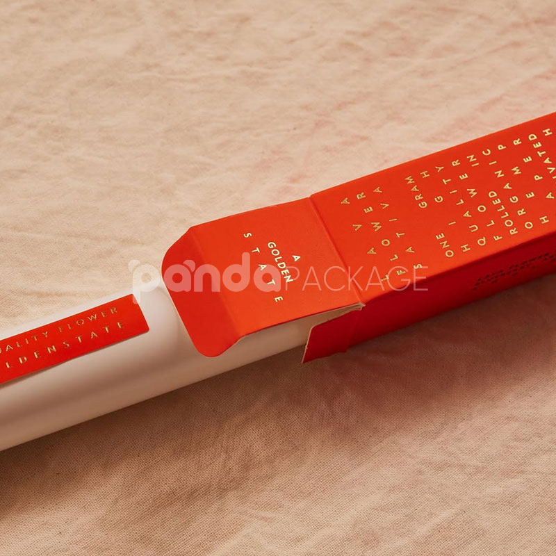 premium matte paperboard box for cannabis pre-roll packaging with gold foil stamping and minimal design