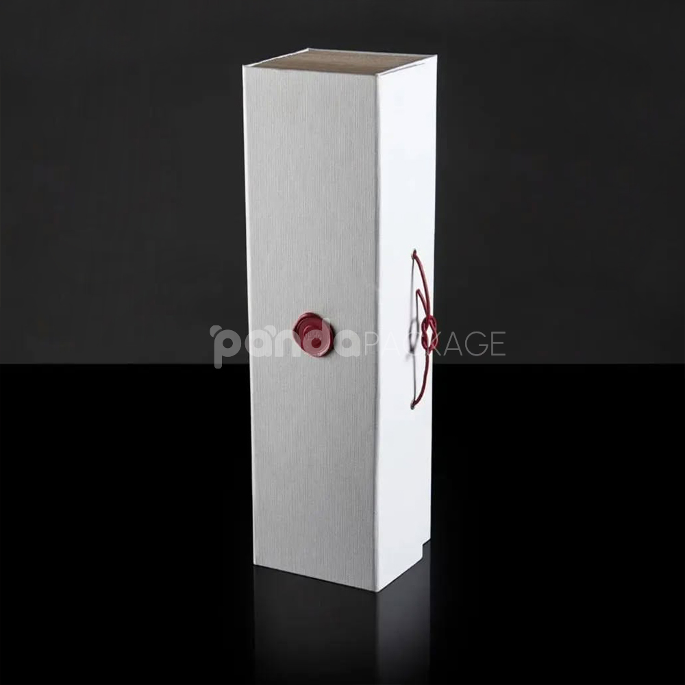 rigid book-style wine packaging box with textured paper surface and wax seal elastic closure for premium red wine bottles