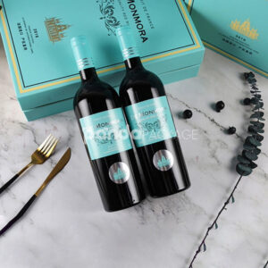 luxury rigid book-style wine packaging box with gold foil details and matching rope-handle gift bag for two-bottle presentation