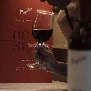 luxury red rigid magnetic wine packaging box with foil stamping and built-in handle for two-bottle presentation