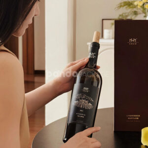 luxury burgundy rigid magnetic wine packaging box with gold foil logo and matching paper bag for single-bottle presentation