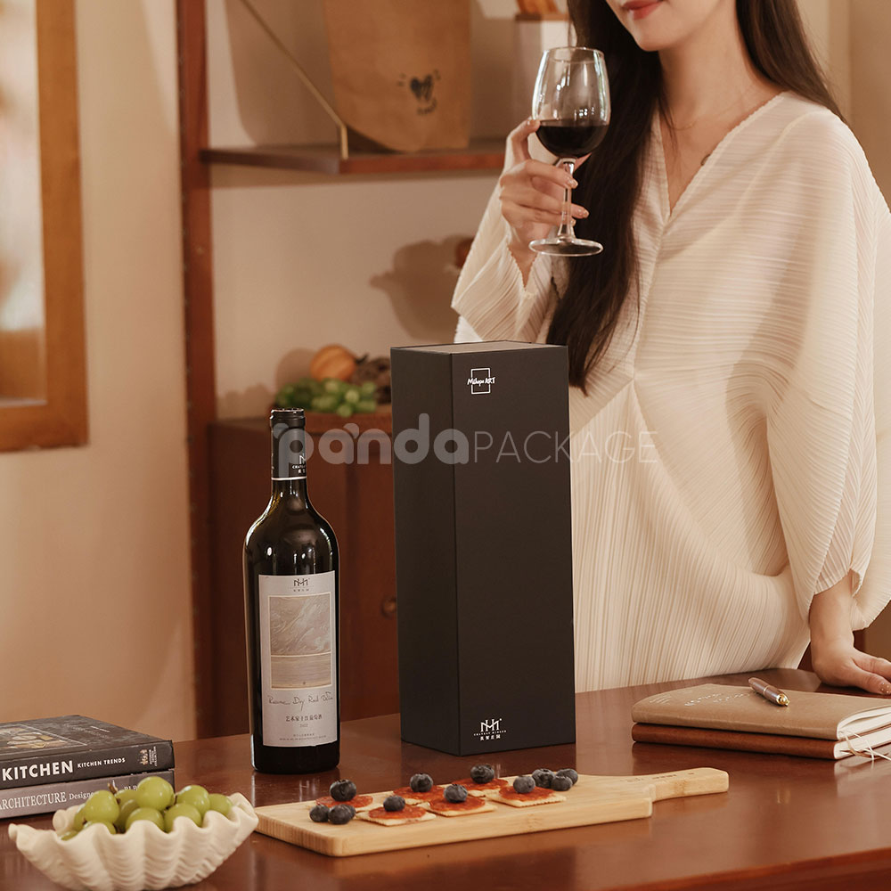 luxury black rigid magnetic wine packaging box with silver foil logo and matching paper bag for single-bottle presentation