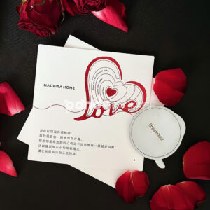 luxury black double-door rigid wine packaging box with heart embossed pattern and red interior for two-bottle gift presentation