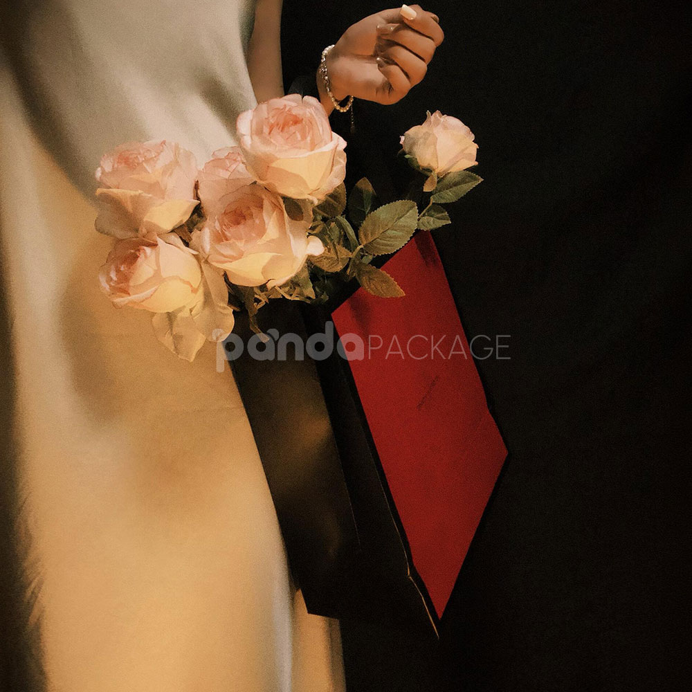 luxury black double-door rigid wine packaging box with heart embossed pattern and red interior for two-bottle gift presentation