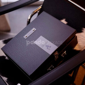 luxury black leather textured rigid wine packaging box with metal lock, suede interior and accessory compartment for premium gifting