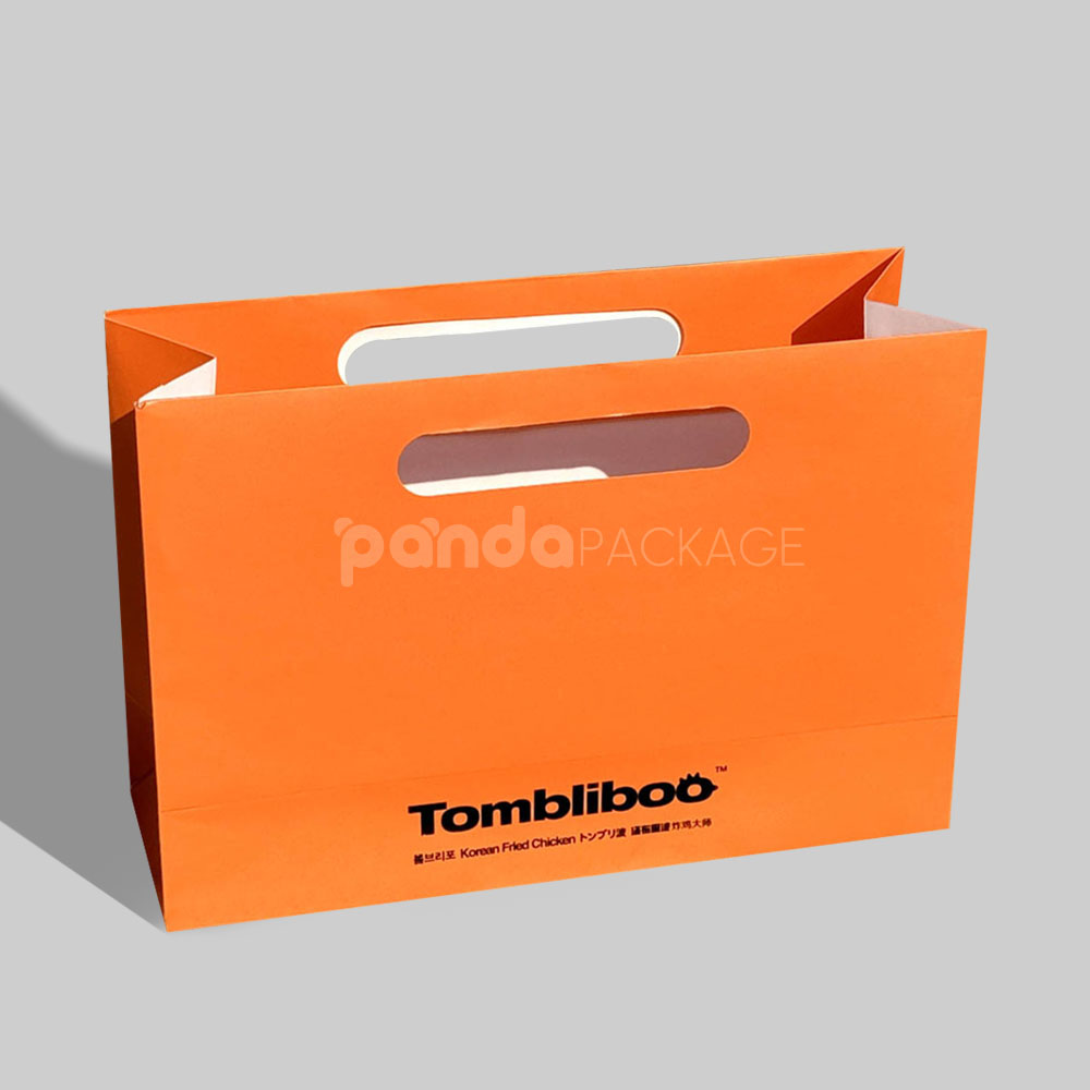 orange paper carry bag with die-cut handle for food packaging