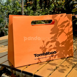 orange paper carry bag with die-cut handle for food packaging