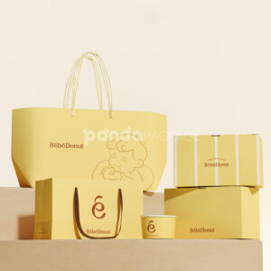 pastel yellow paperboard donut box with lid for bakery takeout and dessert packaging