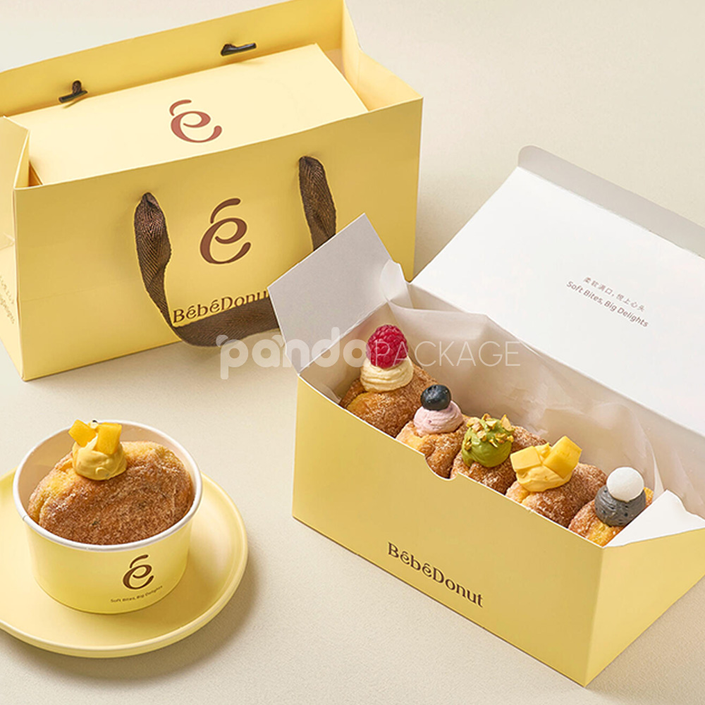 pastel yellow paperboard donut box with lid for bakery takeout and dessert packaging