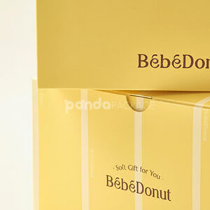 pastel yellow paperboard donut box with lid for bakery takeout and dessert packaging