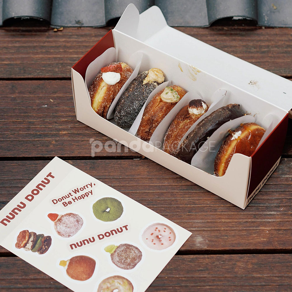 red and pale yellow paperboard donut box with tuck top lid for bakery takeout and gift packaging