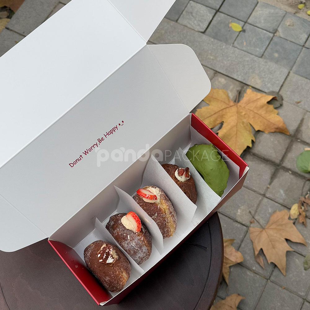 red and pale yellow paperboard donut box with tuck top lid for bakery takeout and gift packaging