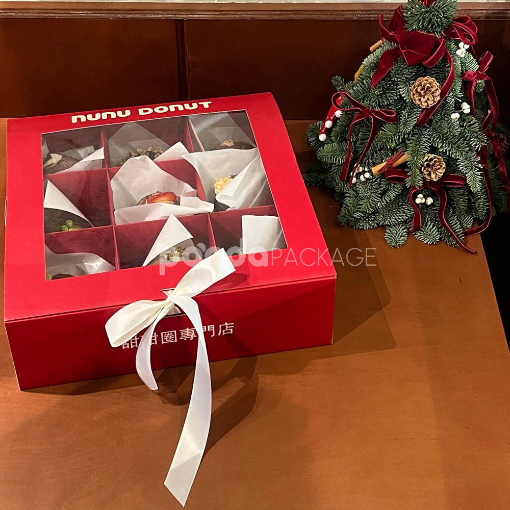 red and pale yellow paperboard donut box with clear window lid and divider grid for bakery gift packaging