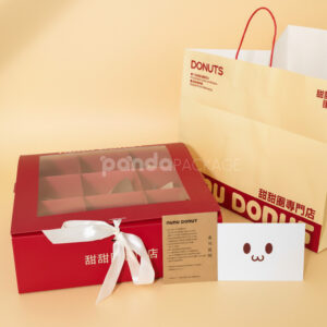 red and pale yellow paperboard donut box with clear window lid and divider grid for bakery gift packaging