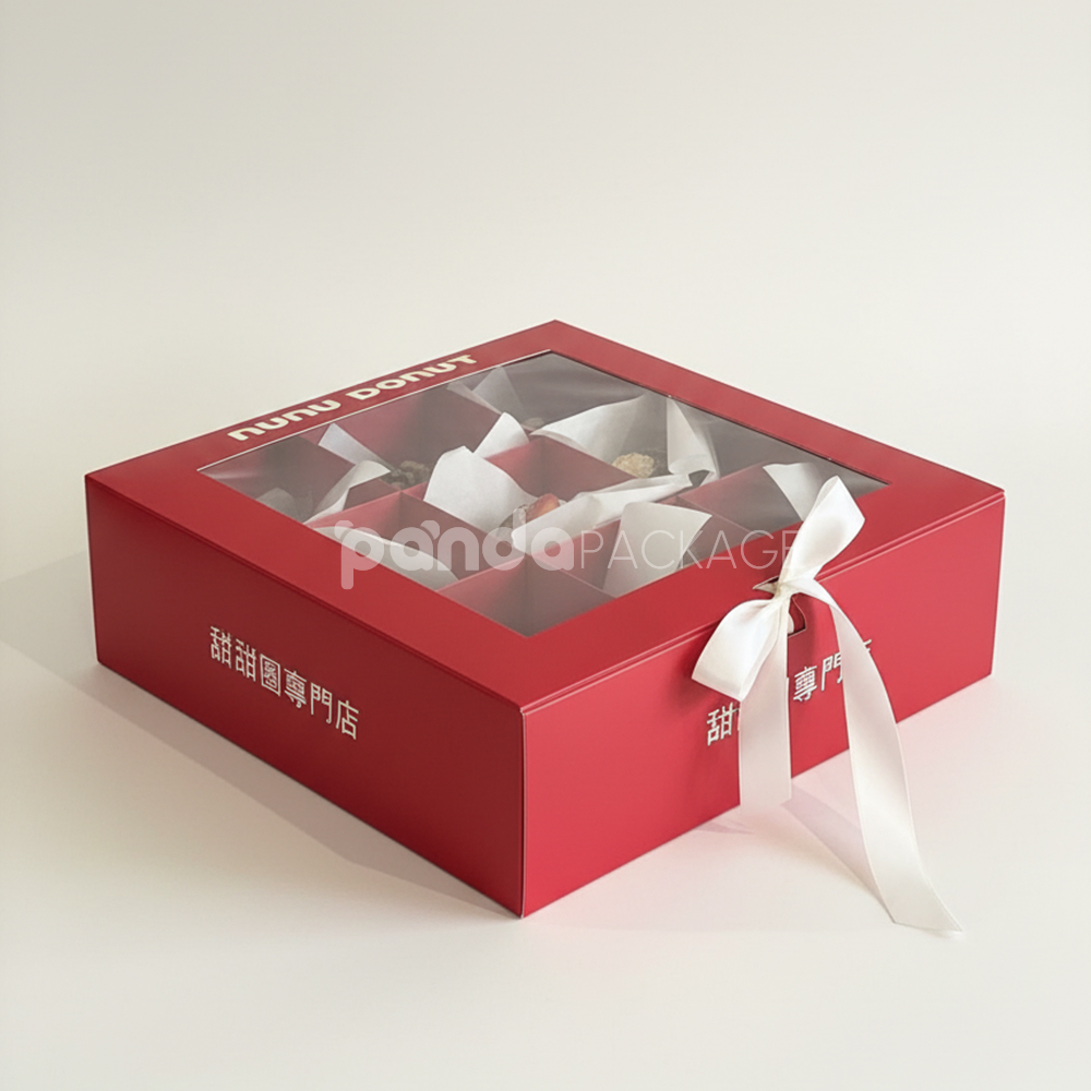 red and pale yellow paperboard donut box with clear window lid and divider grid for bakery gift packaging