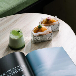 white paperboard donut tray with cute cartoon character design for bakery takeout and dessert packaging