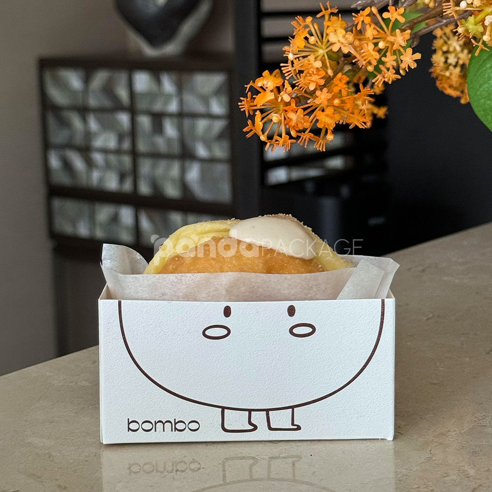 white paperboard donut tray with cute cartoon character design for bakery takeout and dessert packaging