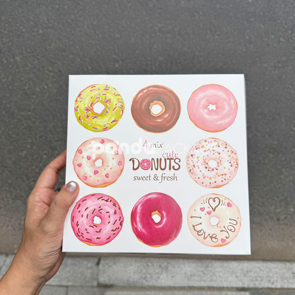 white paperboard donut box with colorful illustrated design for bakery gift and dessert packaging