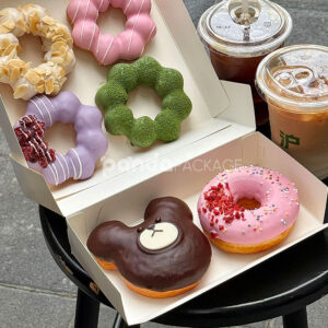 white paperboard donut box with colorful illustrated design for bakery gift and dessert packaging