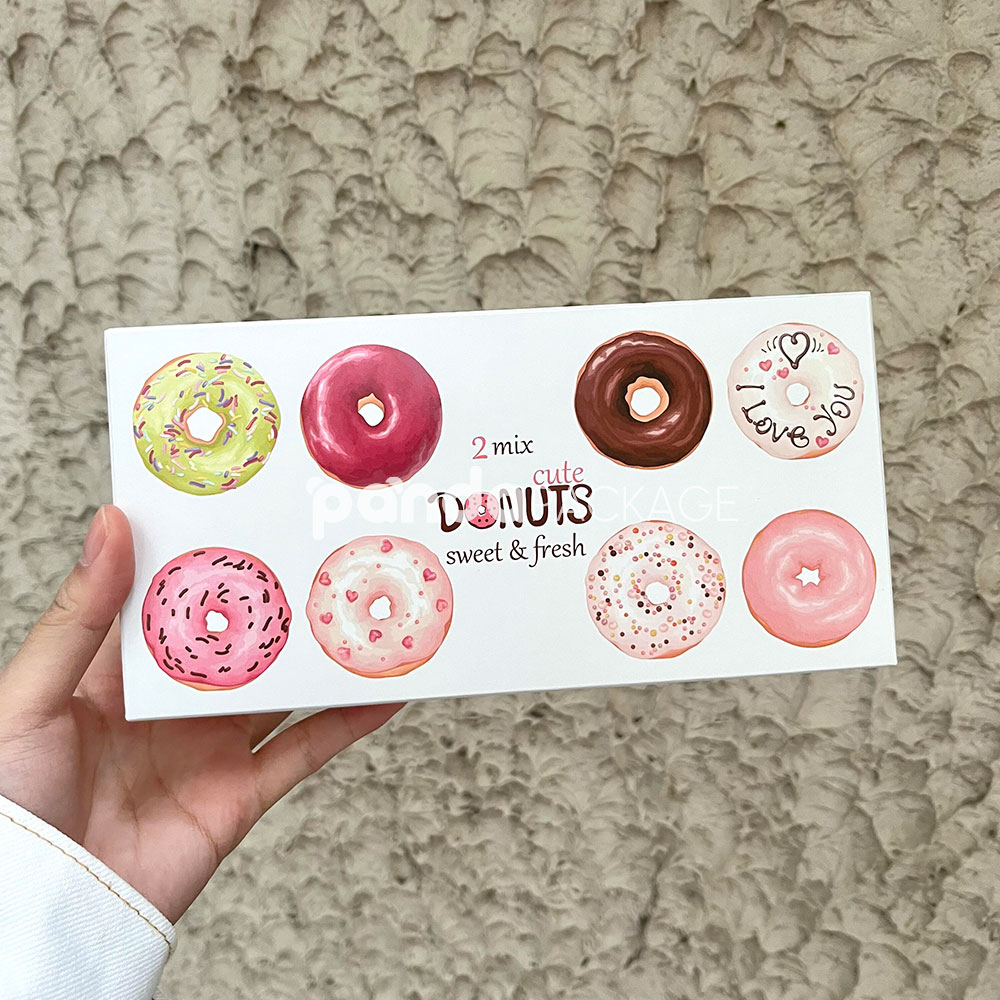 white paperboard donut box with colorful illustrated design for bakery gift and dessert packaging