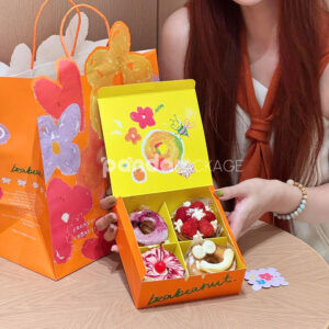 colorful paperboard donut gift box and bag with hand-painted illustration and yellow interior for bakery and dessert packaging