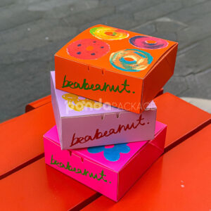 colorful paperboard donut gift box with hand-painted illustration and yellow interior for bakery and dessert packaging