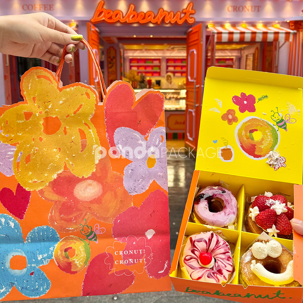 colorful paperboard donut gift box and bag with hand-painted illustration and yellow interior for bakery and dessert packaging